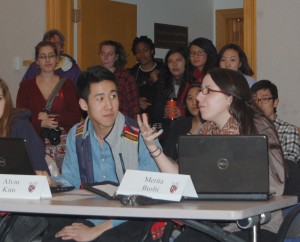 Academic Affairs Committee Chair Merita Bushi ’14, right, speaks at Tuesday’s MCSG meeting alongside Student Liaision to the Board of Trustees Alvin Kim ’14. Bushi and Kim introduced a resolution calling for more diversity in faculty hiring, which passed unanimously. Photo by Maddie Jaffe ’17.