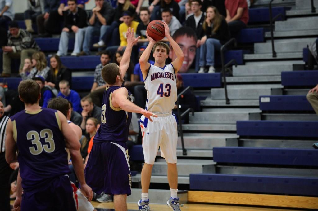 Pierce Peters ’13 goes up for a jump shot against Northwestern on Nov. 20. Peters led the Scots in scoring every year he was on the team and was sixth on the all-time Macalester scoring list. The team has lost all 17 games it has played since Peters’ departure. Photo Credit: Christopher Mitchell / SportShotPhoto.com