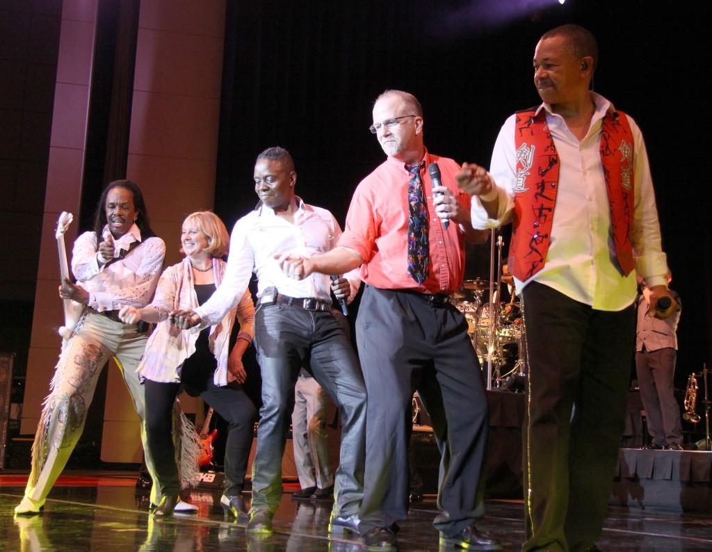 Professor George Leiter performs onstage with Earth, Wind and Fire. In addition to teaching math, Leiter plays rock music every week.  (Photo courtesy of Leiter.)