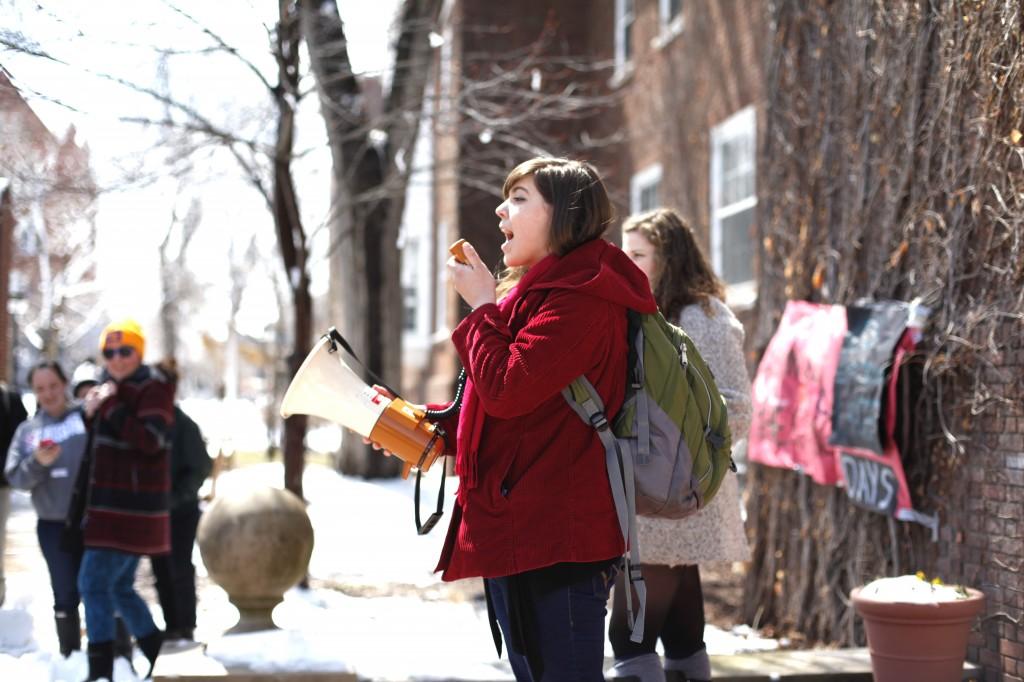 Leewana Thomas ’14 rallies a group of students and community members to support protesting KWOC members outside of Weyerhaeuser Tuesday afternoon. Photo credit: Will Matsuda ’15