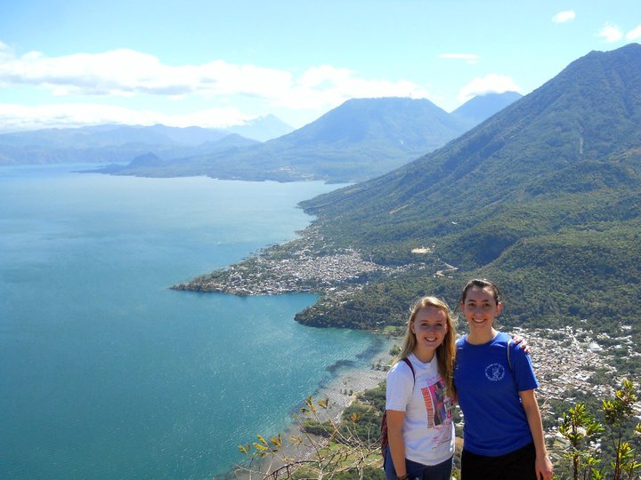 Hardin and Magnuson pose atop an overlook of Lake Atitlán, Guatemala, the site of the Rising Minds J-term trip they will lead for the second time and experience for the third time this January. Photo courtesy of Magnuson.