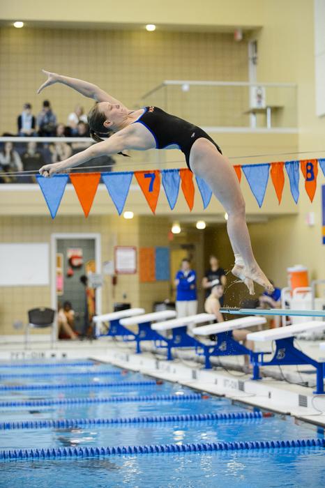 Hunter Hedenberg ’16 performs a dive last year. Hedenberg won a MIAC title in the 1-meter dive that season. Photo courtesy of Christopher Mitchell.  