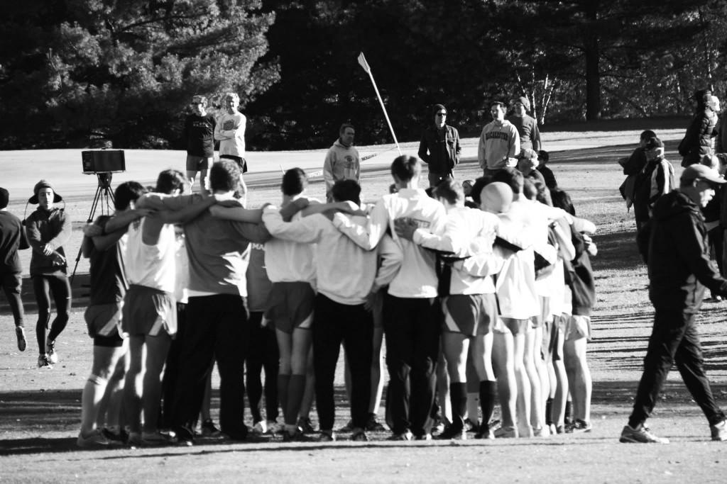 The Men’s Cross Country team huddles before competing in the MIAC Championships at Como Park in Saint Paul. The team finished sixth out of 11 in the conference. Photo courtesy of Steve Gilfix.