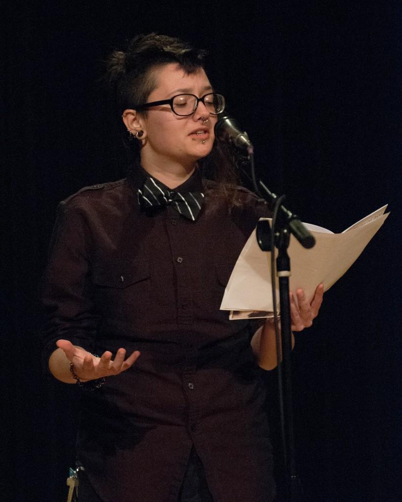 Oliver Schminkey ’16 performs a self-written poem at Patrick’s Cabaret. Schminkey is a returning performer to the Minnehaha-located space. Photo courtesy of Jim Smith.