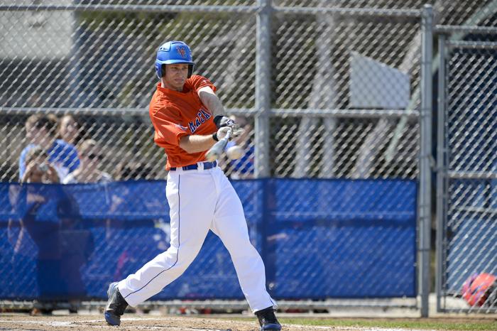 Macalester first baseman Justin Sims ’14 is just as passionate about baseball as he is with math. That has motivated Sims into pursuing a profession in baseball scouting and analytics upon his graduation. He recently accepted a job offer with the New York Yankees. Photo courtesy of Christopher Mitchell.