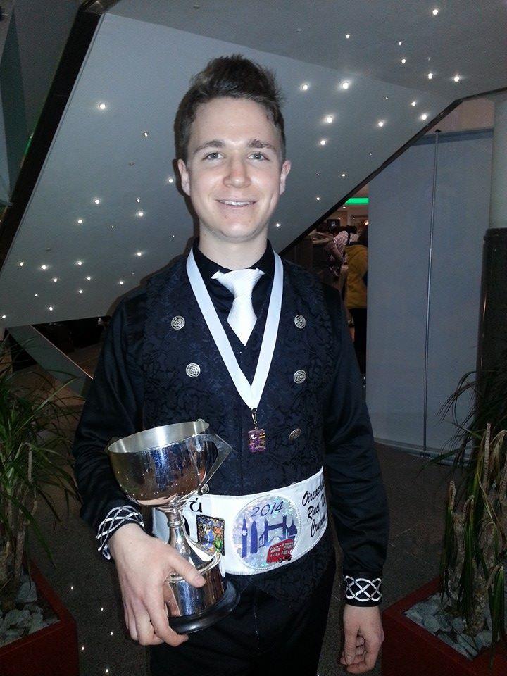 Ian Luebbers ‘17 poses with his fifth place trophy at the Irish Dance World Championships in London. Photo courtesy of Ian Luebbers.