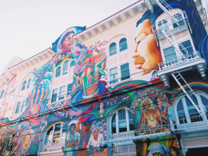 A colorful mural on the side of a building in The Mission.  Photo by Joe Huber15.