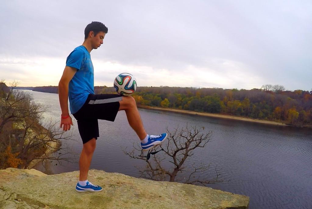 Michael Bliss ’18 practices freestyle soccer along the Mississippi River. He recently traveled to California for a freestyle filming competition. Photo courtesy of Michael Bliss ’18.