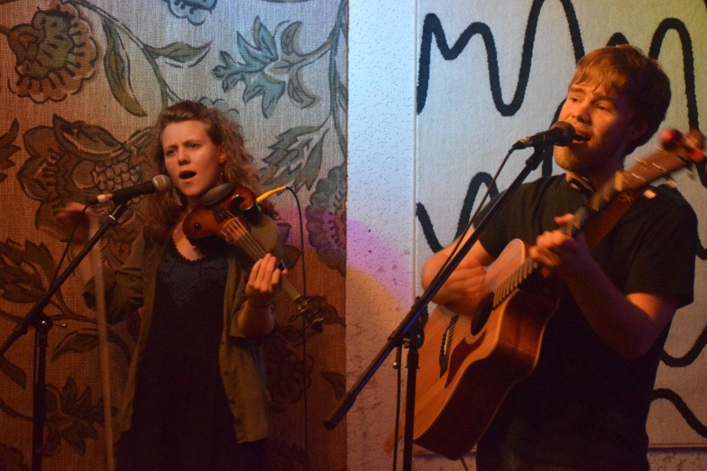 Hannah Scout-Field ’17 on electric violin and Ryan Dugan ’17 on acoustic guitar perform at Minneapolis’ Driftwood Char Bar.