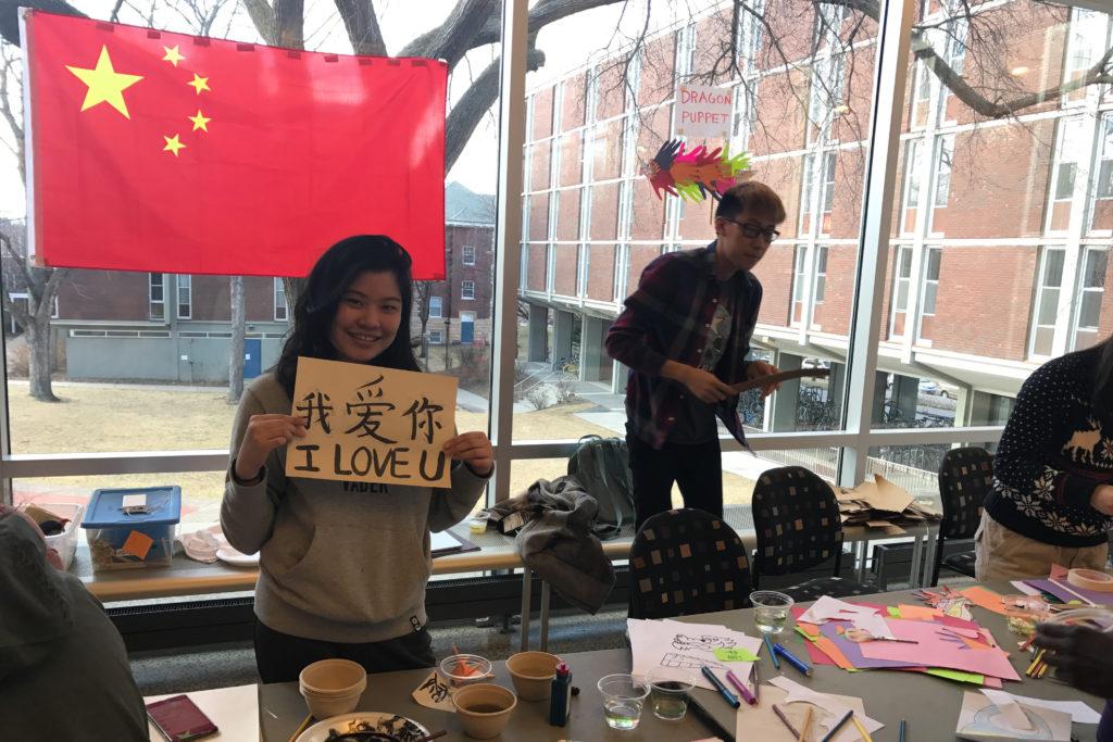 Students at the China booth. Photo courtesy of Christina Cai ’20. 