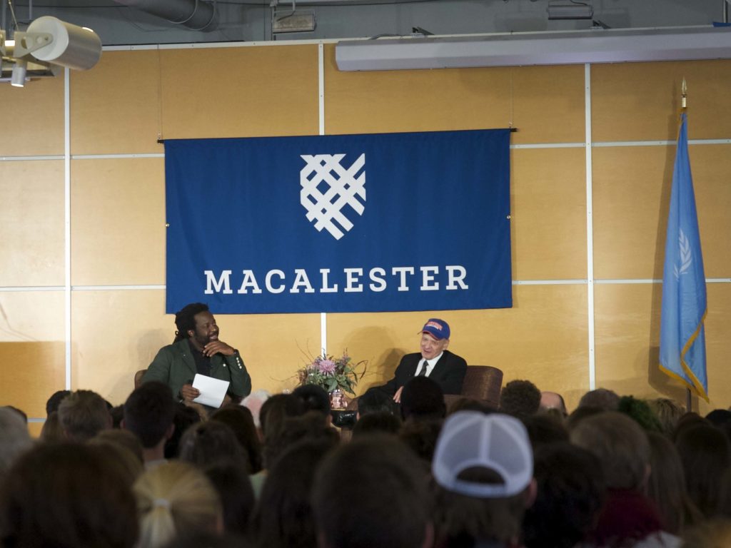 Left to right: English Professor Marlon James and Macalester alumnus Tim O’Brien ’68 discuss O’Brien’s The Vietnam War. Photo by Ally Kruper ‘21.