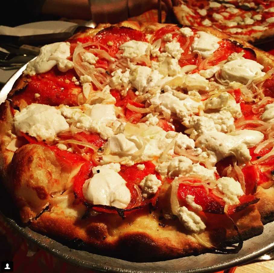 Black Sheep Pizza topped with goat cheese, feta, onions, garlic and pepperoni. Photo courtesy of Lee Guekguezian ’18.
