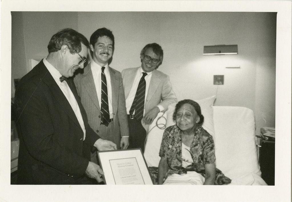 Dr. Catharine Lealtad being presented her second honorary degree “Doctor of Humane Letters” in 1983. 
Photo courtesy of Macalester Archives.