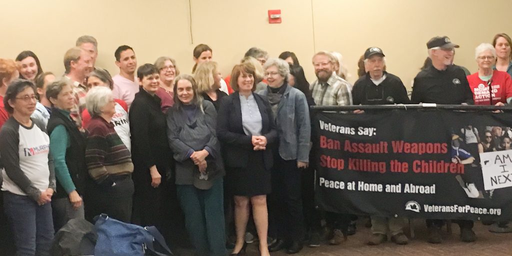 State Rep. and DFL gubernatorial candidate Erin Murphy poses for a picture with town hall attendees. Photo by Margaret Moran ’21.