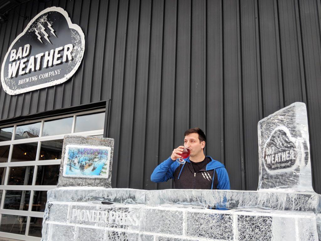 Joe Giambruno sips a craft brew outside Bad Weather Brewing Company. Photo courtesy of Henry Nieberg ’19.