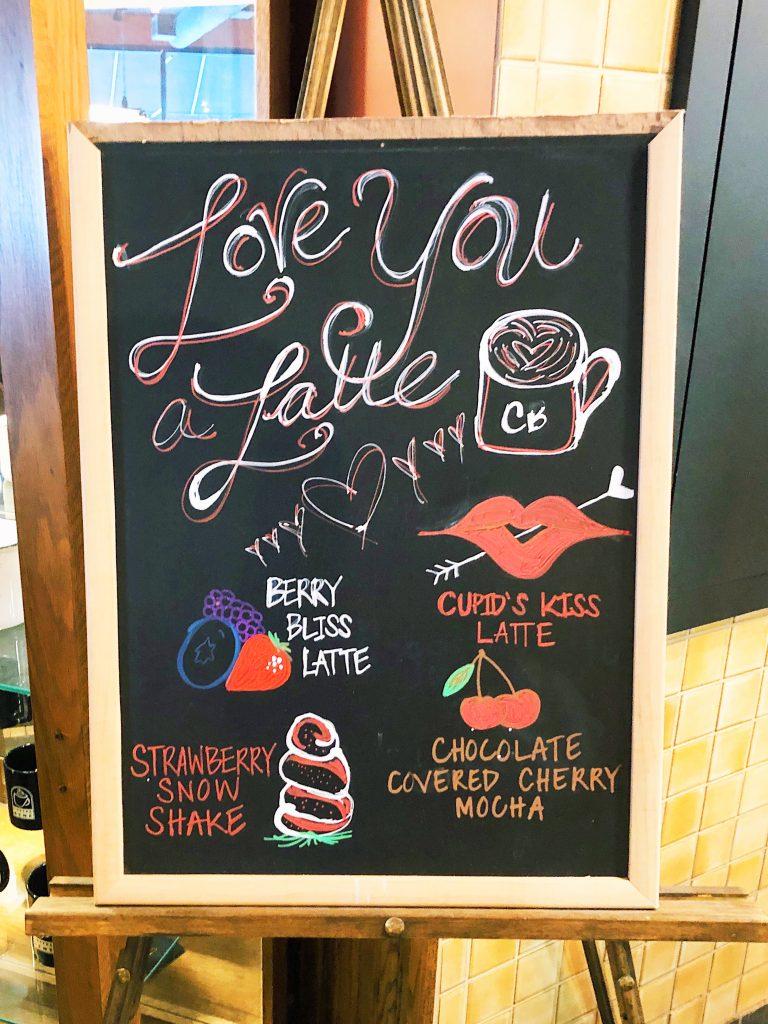 Coffee Bené’s specialty board features the Valentine’s Day drinks and a love-themed play on words.