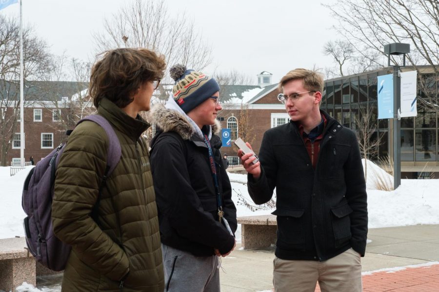 Hooten interviews students in front of the CC. Photo by Kori Suzuki ’21