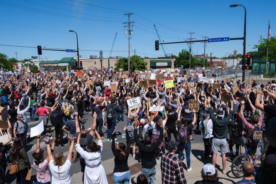 Hundreds of protesters show solidarity for George Floyd on the corner of Nicollet Ave and E 31st St. Photo by Kori Suzuki 21.