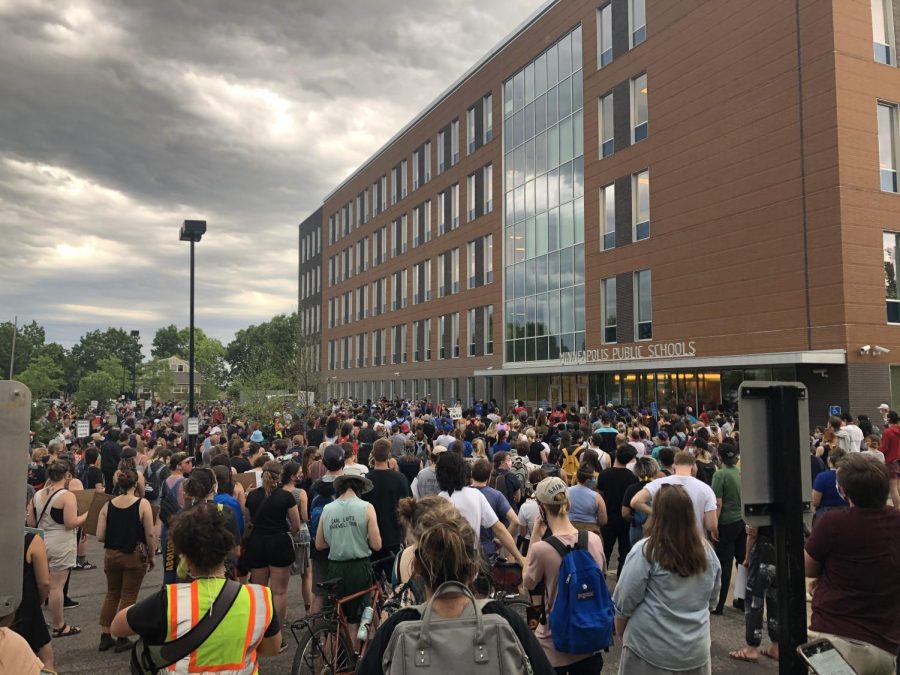 Demonstrators gather around the Minneapolis Public Schools building on June 2nd to encourage the school board to cut ties with the Minneapolis Police Department. Photo by Abe Asher 20.