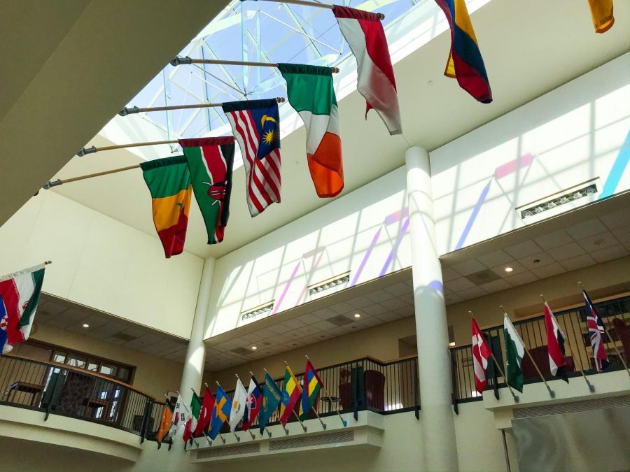 Flags hanging in the campus center. Photo by Hannah Catlin '21.