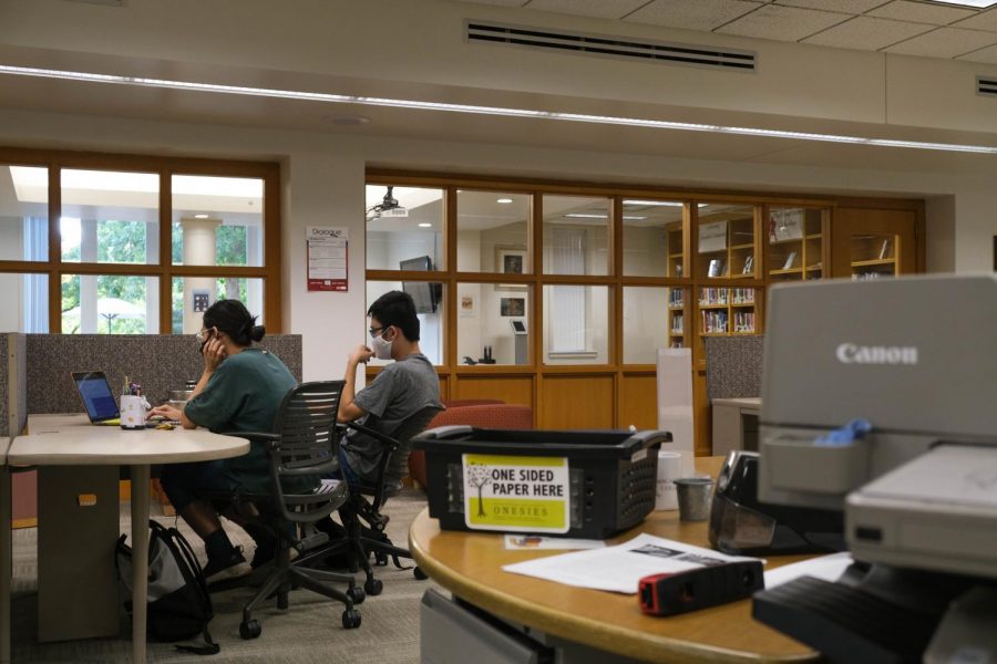 Students work in the library at the end of the quiet period. Photo by Malcolm Cooke 21.