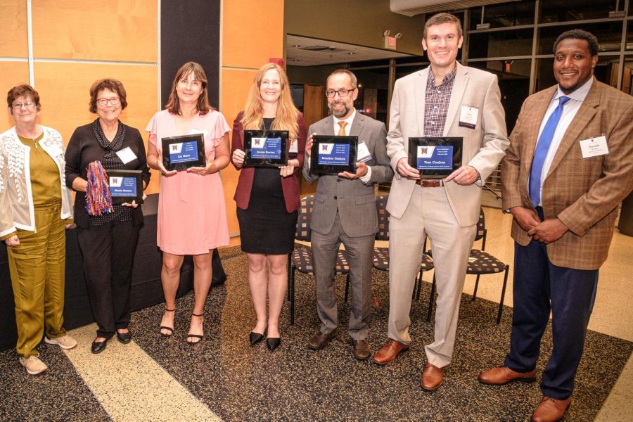 New Hall of Fame members recieve plaques during M Club banquet. Photo courtesy of Macalester Athletics.