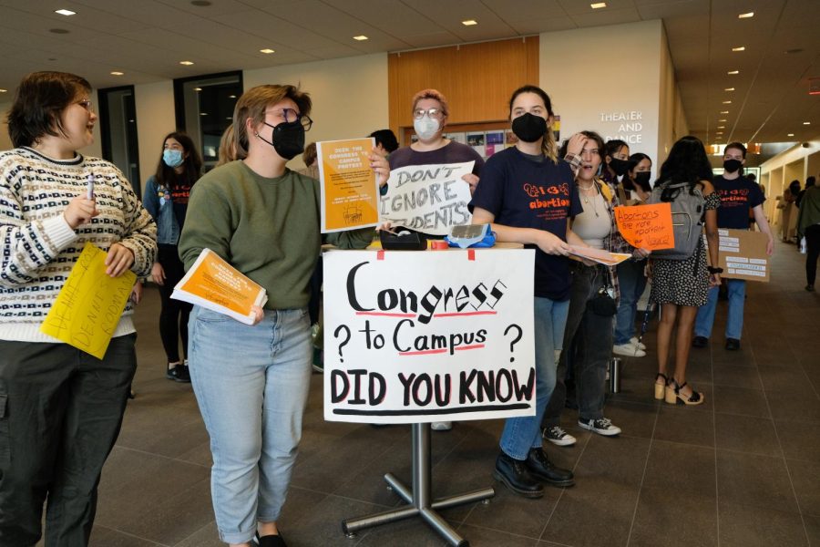 Students gather in the Janet Wallace lobby to protest Congress to Campus. Photo by Jerome Paulos ’26.