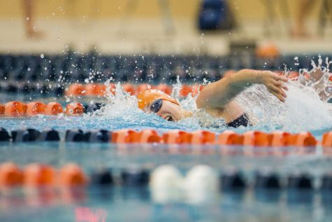 Skye Schmit ’26 swims against Luther College. Photo courtesy of Macalester