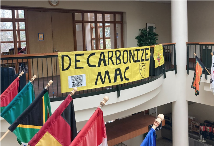 Decarbonize Mac banner in the Campus Center. Photo courtesy Sunrise Macalester.