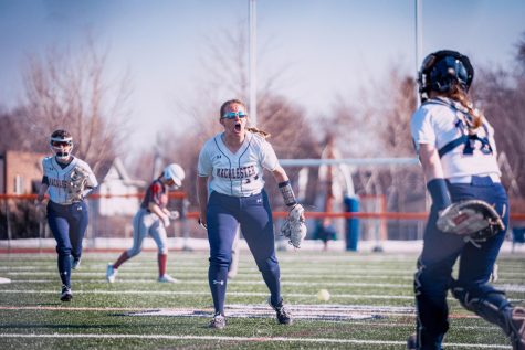 Kara Jensen 26 celebrates retiring a Hamline batter. Photo courtesy of Robert Grace IV 25. 