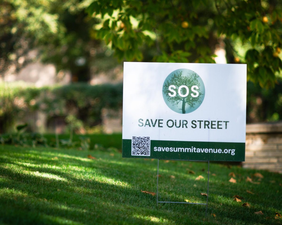 A SAVE OUR STREET yard sign in front of a Summit Avenue home. Photo courtesy of Rory Donaghy 24.