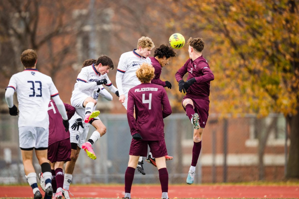 Hans Haenicke 25 heads in the second goal. Photo courtesy of Macalester Athletics. 