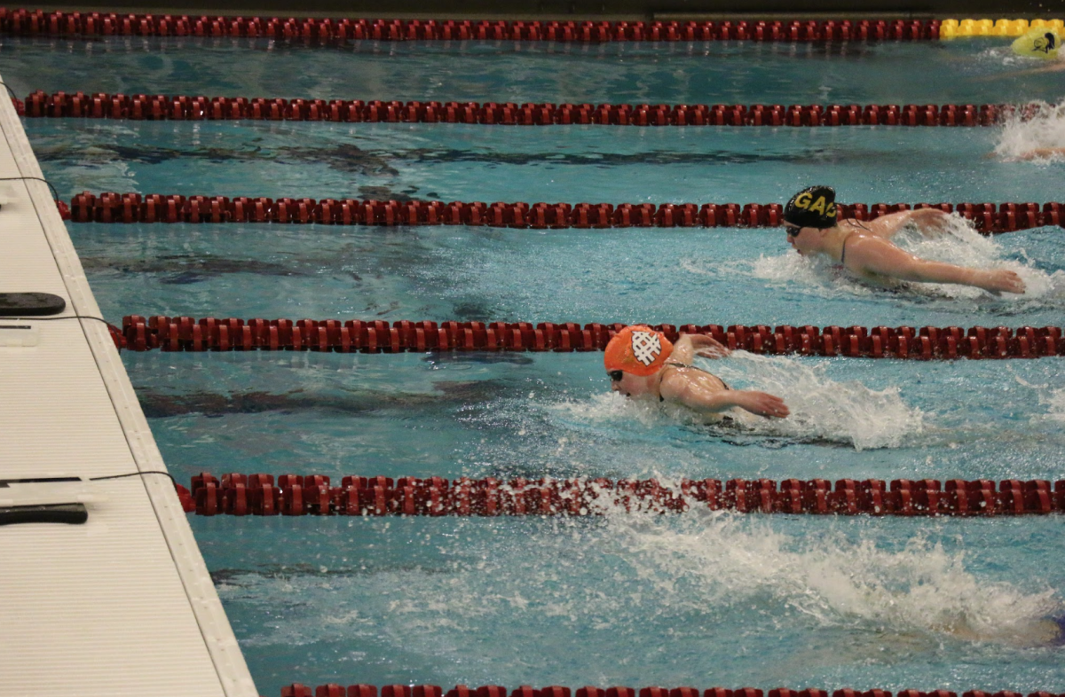 Izzy Uhlhorn-Thornton ’26 logged first-place finishes in the 100 and 200 yard breaststroke races at MIACs this week. 

Photo by Eleanor Lazaroff ’27. 