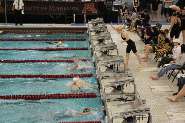 The MIAC Swimming and Diving Championships took place this week at the University of Minnesota Aquatic
Center. Eleanor Petrin ’25 cheers on her teammate Izzy Uhlhorn-Thornton ’26. Photo by Ava Cherry ’27.