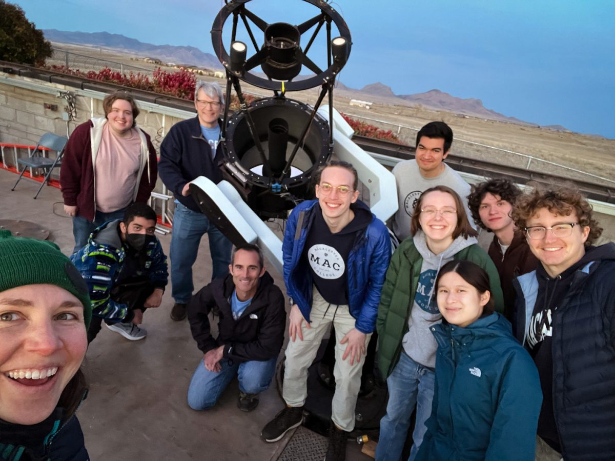 The Phys 440 cohort preparing for a night of robotic observing with the Robert L. Mutel Telescope. Photo courtesy of Anna Williams.