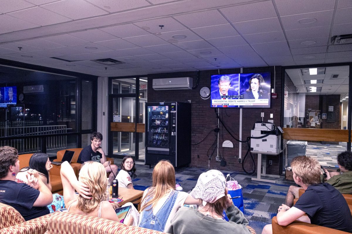 First-year students gather in the Dupre 1 lounge to watch the presidential debate