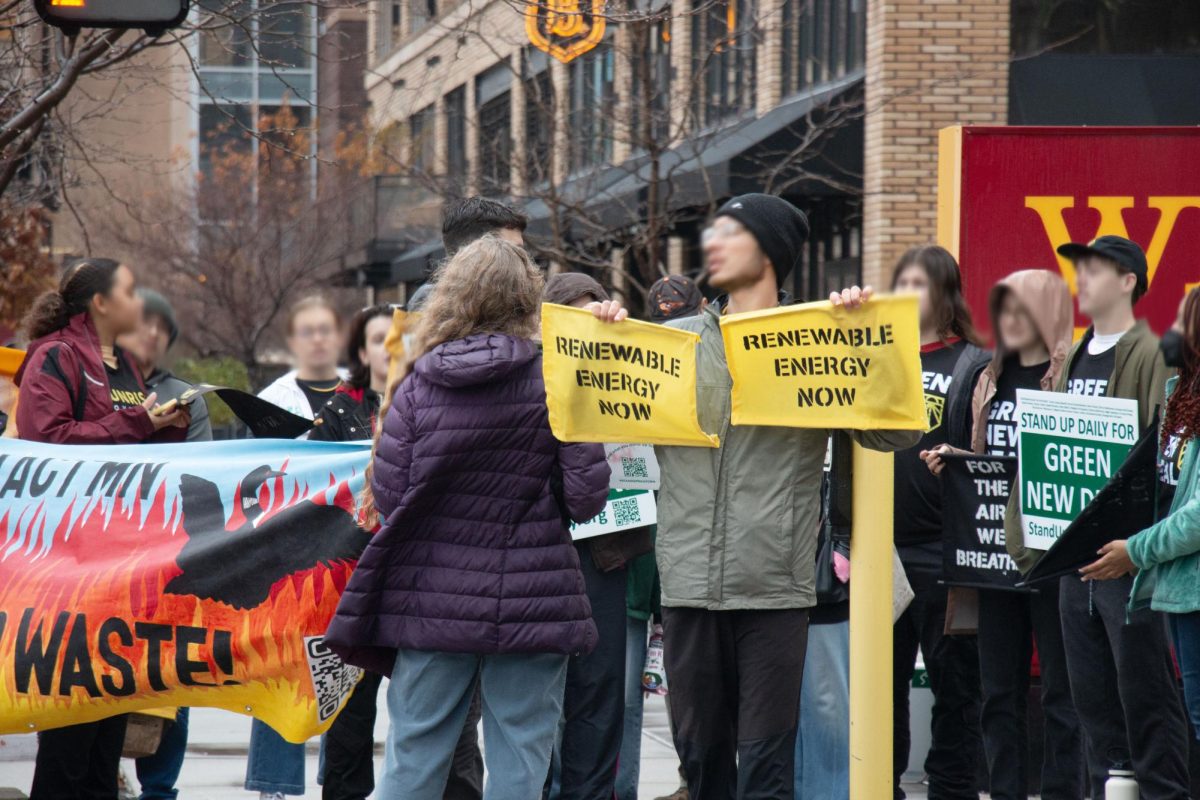 Sunrise Twin Cities and Third Act protesters unite against Wells Fargo.