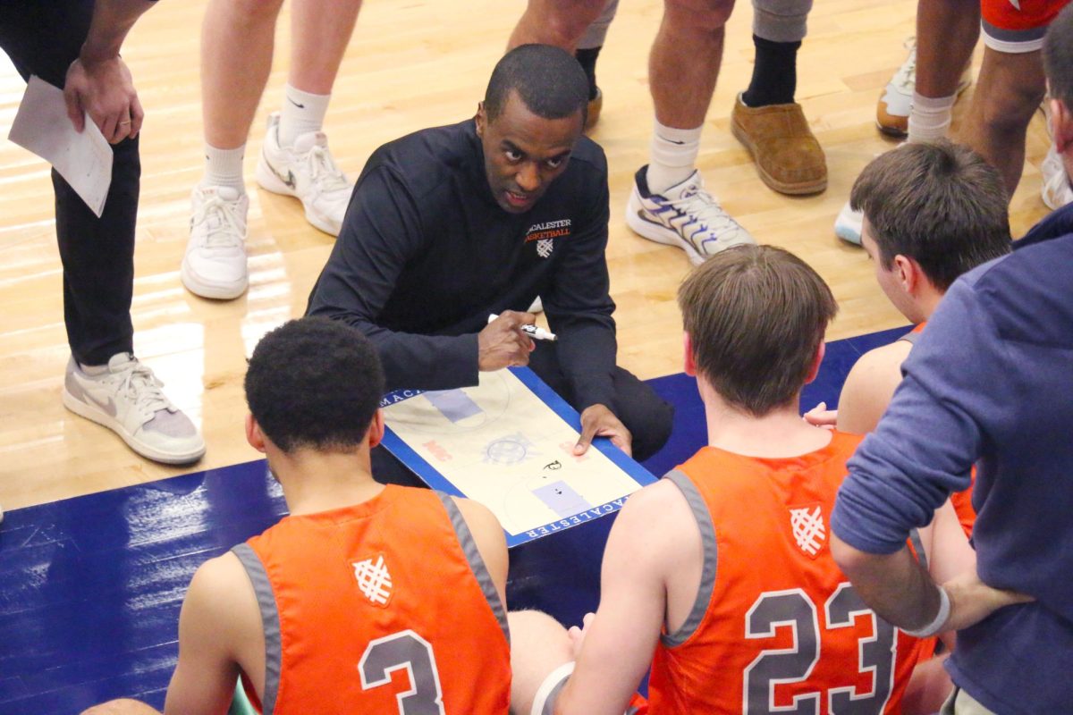 Head Coach Abe Woldeslassie ’08 huddles up with (left to right) Robert Grace IV ’25, JP Kerrigan ’28 and Berke
Arslan ’27.