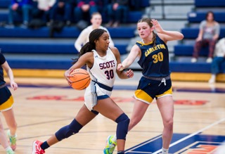 Peyton Starks ’25 became the second-leading scorer in Scots history on Feb. 19. Photo by Chris Mitchell ’01, Sport Shot Photo.