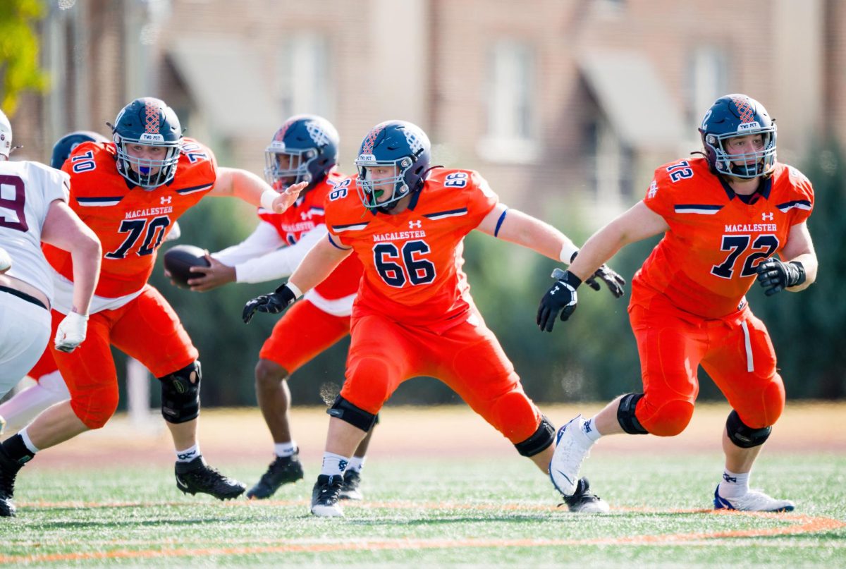 Macalester’s offensive line protecting their quarterback. Photo courtesy of Mac Athletics.