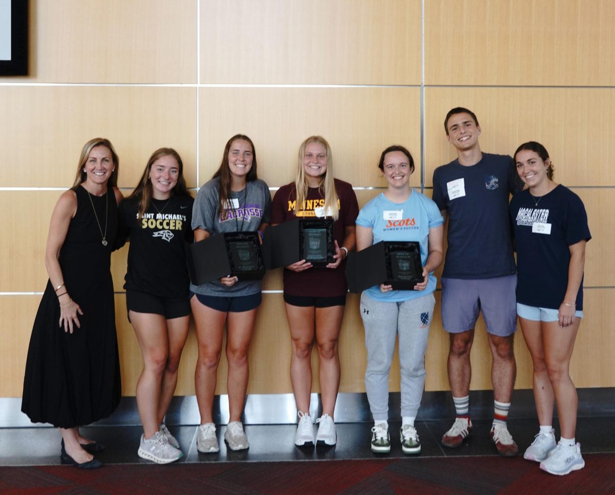 Mac’s Team IMPACT fellows winning D-III award. Photo courtesy of Team IMPACT.