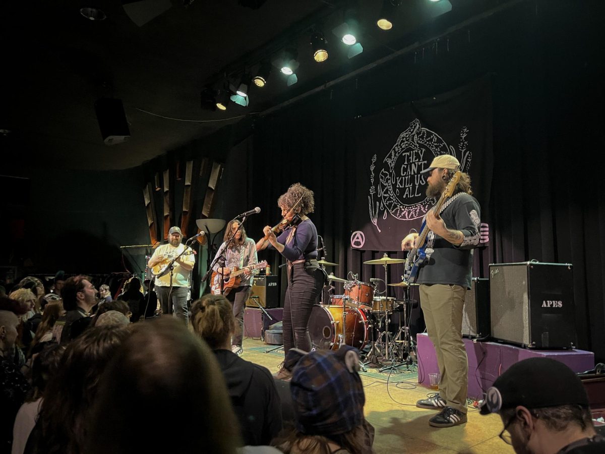 Apes of the State performs at The Cedar Center. From left to right: Dan
Ebersole, April Hartman, Mollie Swartz, Ian Cornele. Photo by Sam Kennedy '27