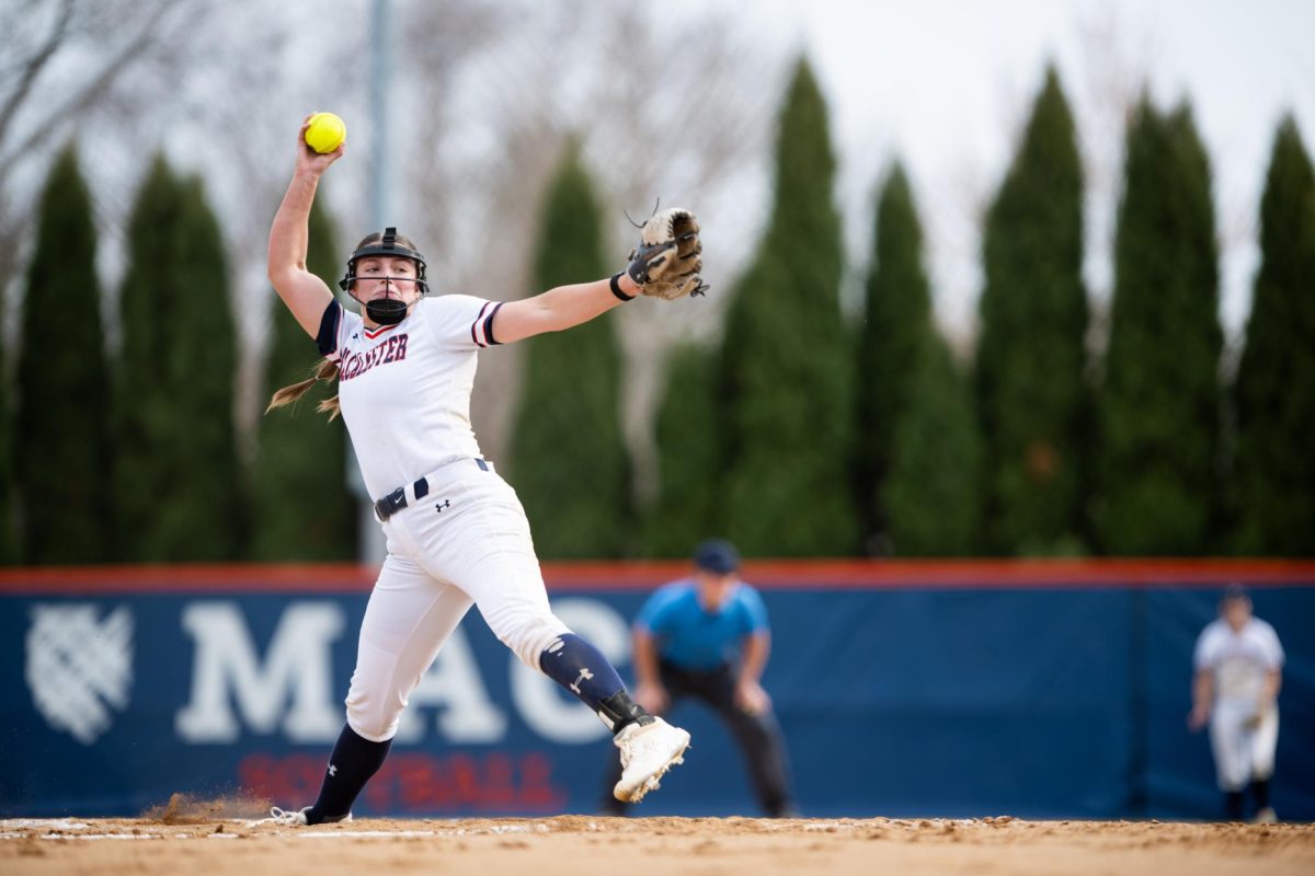 Martha Miller ’27 hurls a pitch. Photo courtesy of Macalester Athletics
